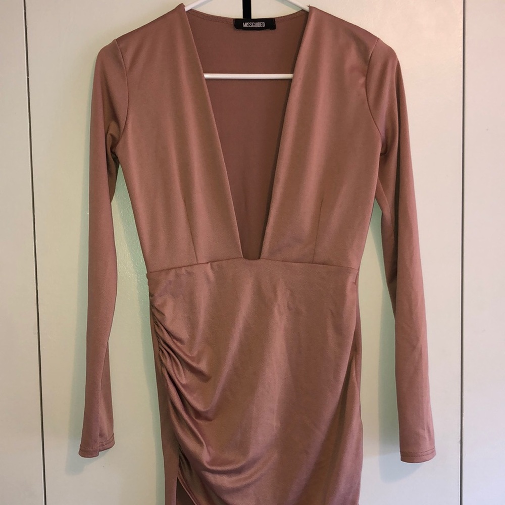 Nice dress bought from someone else but haven't worn it much.
